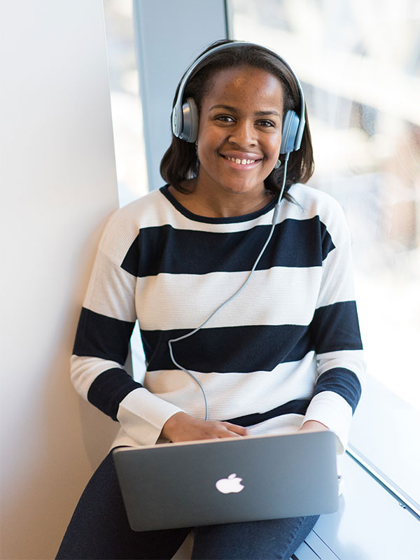 former homeless youth with laptop | Covenant Home