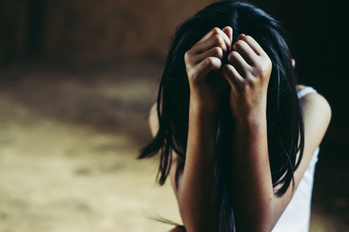 Sad human trafficking survivor | Covenant Home - Donate Now