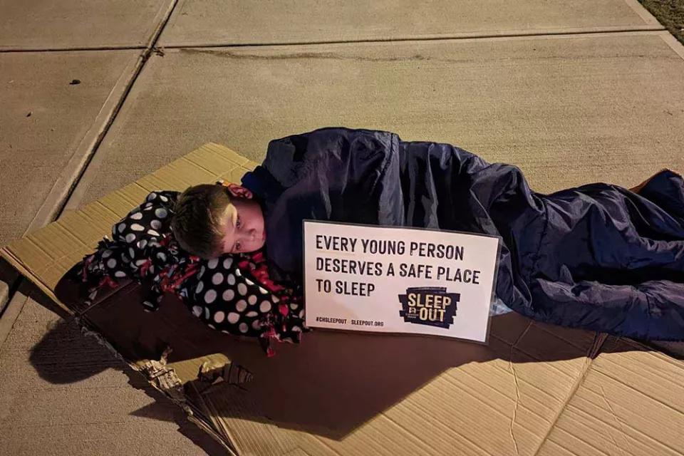 Kid participating in Covenant Home Sleep Out