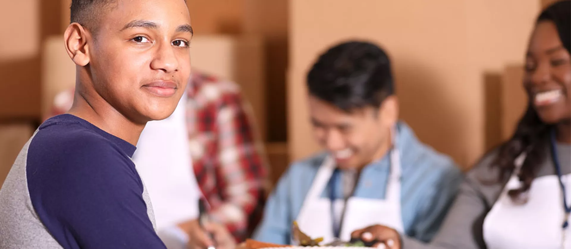 youth receiving meal at Covenant Home | Issues - Gap in Foster Care