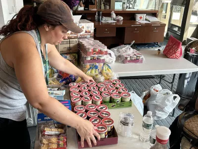 Staff getting food and snacks prepared for displaced youth during crane emergency in New York