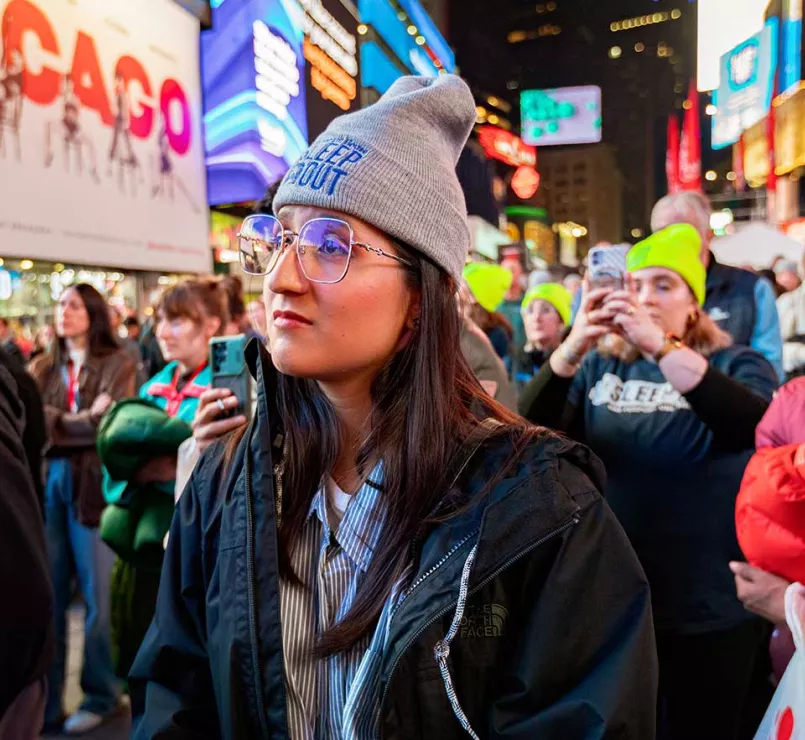 Covenant Home Sleep Out volunteer in Times Square NYC | Raising funds and awareness for homeless youth